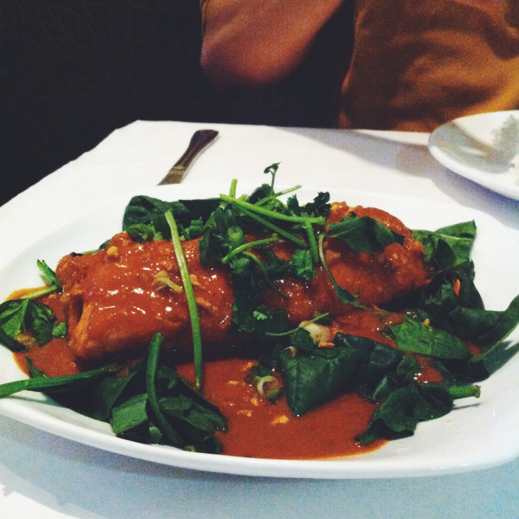 HUGE salmon fillet with a spicy sauce and spinach at a delicious Thai restaurant <3 always end up with some sort of food baby after Thai food XD
